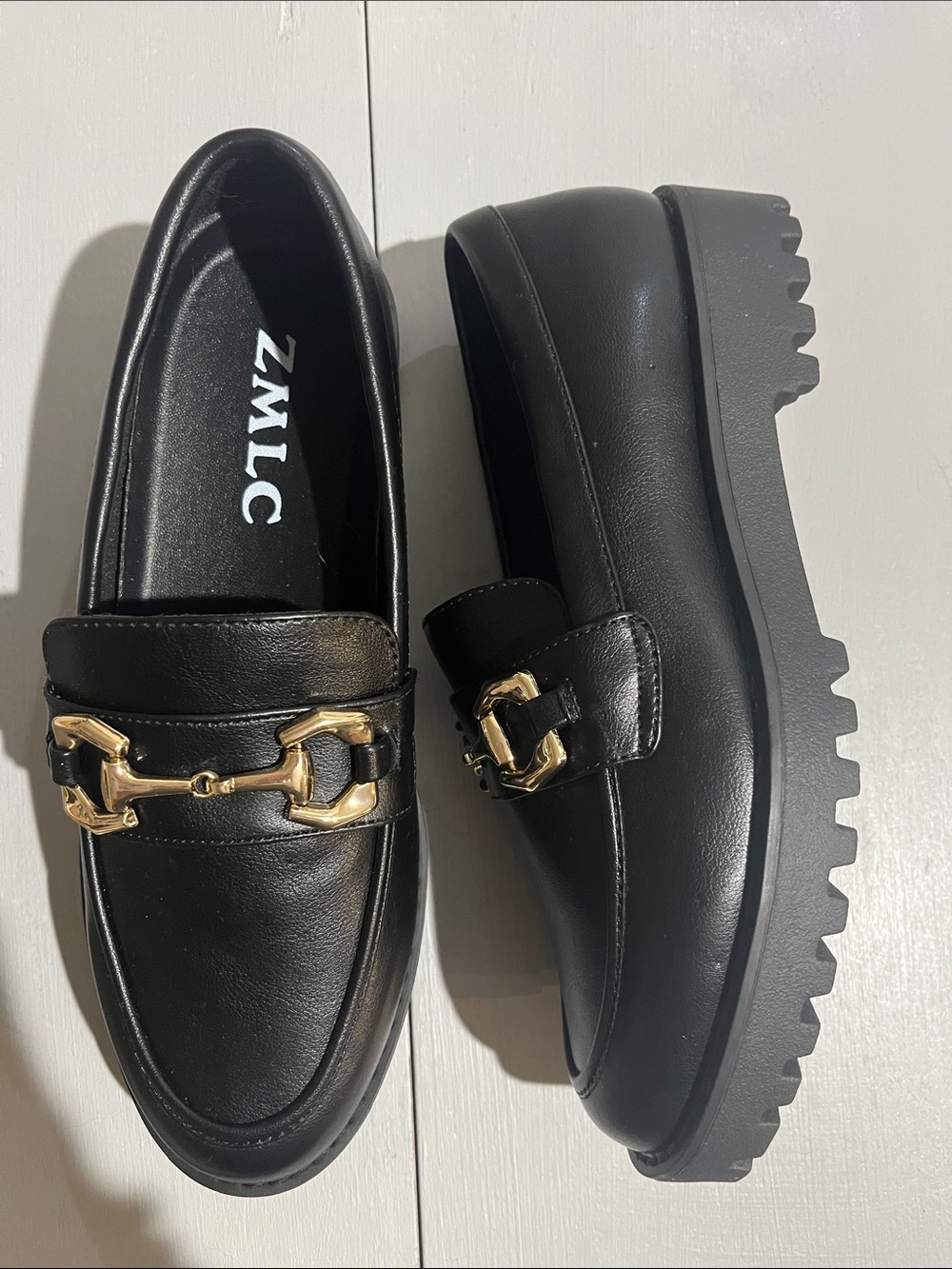 Black Platform Loafers with Gold Hardware